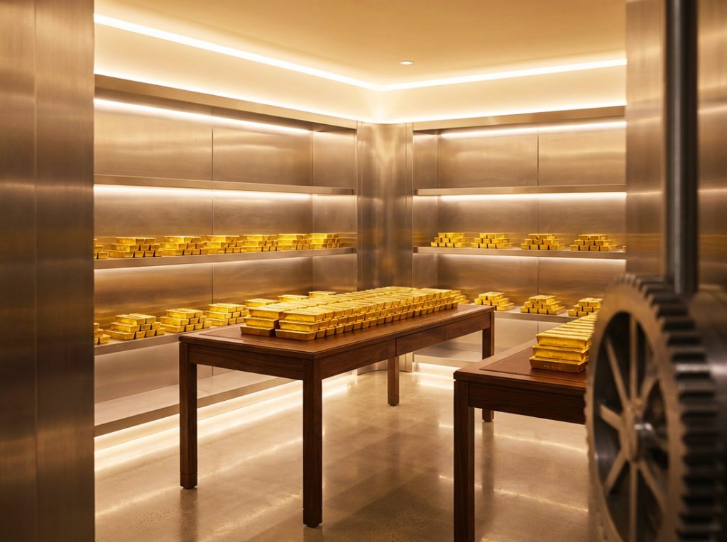 a vault holding gold bars
